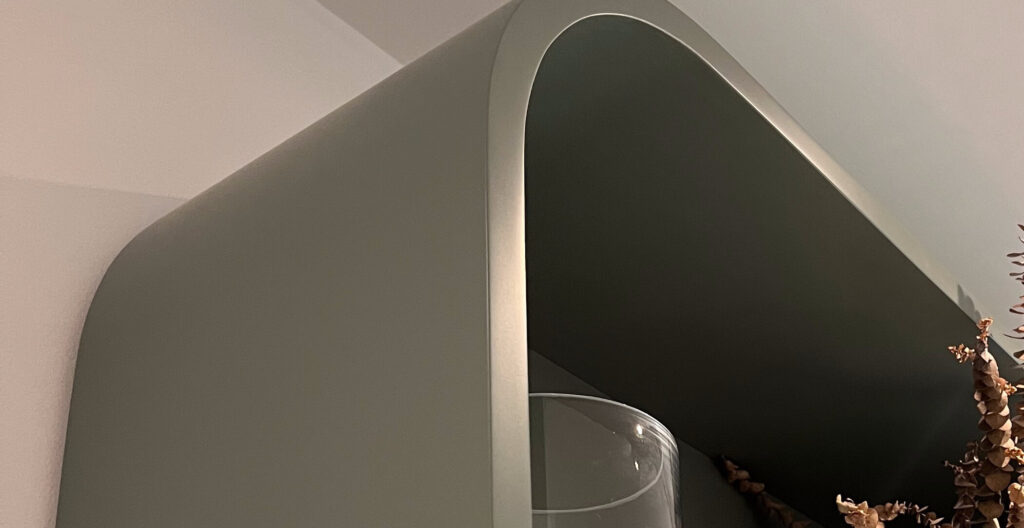 Curved bullnose return at the end of the media wall lf bespoke interiors